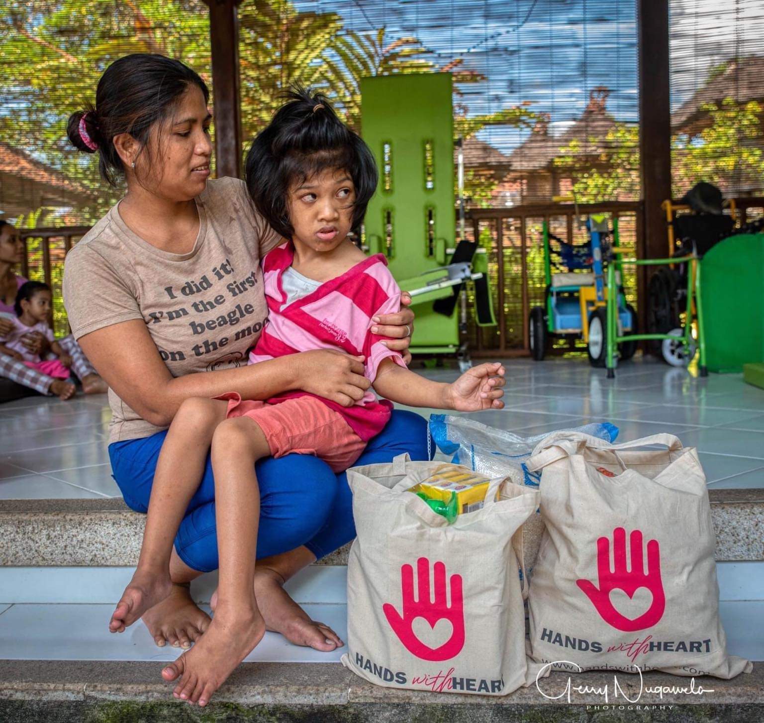 Volunteer playing with child